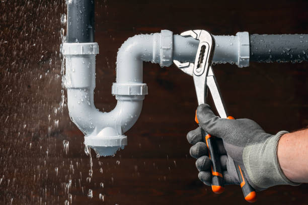 Professional Sewer Line Repair technician working in Raymond, NH